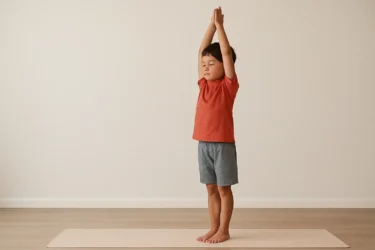 a kid doing palm tree pose tadasana