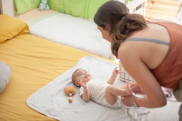 mother taking care of baby